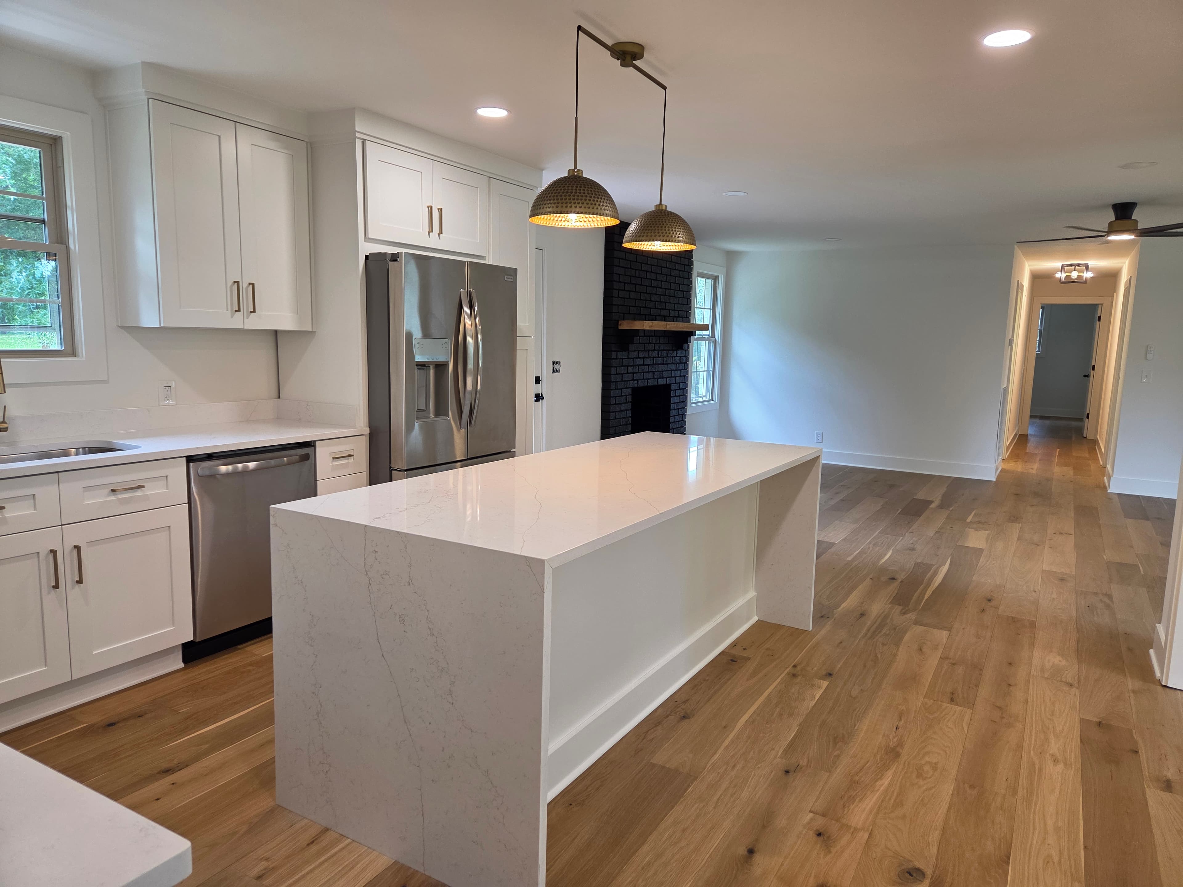 Modern kitchen and dining remodel by Peerless Development